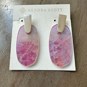 Kendra Scott Aragon drop earrings.